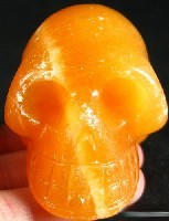 Bright Orange Calcite Skulls