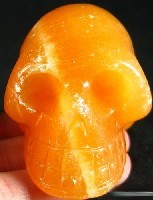 Bright Orange Calcite Skulls